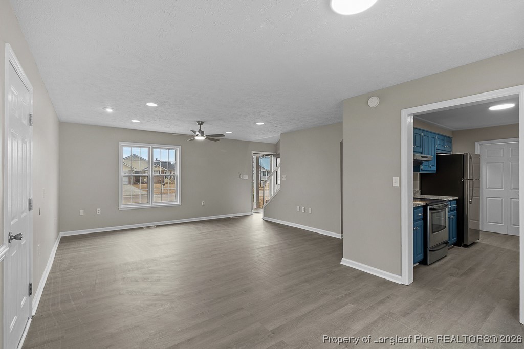 122 Spring Valley Drive Raeford, NC 28376 - Photo 9 of 36 a view of a kitchen with a sink and a stove top oven