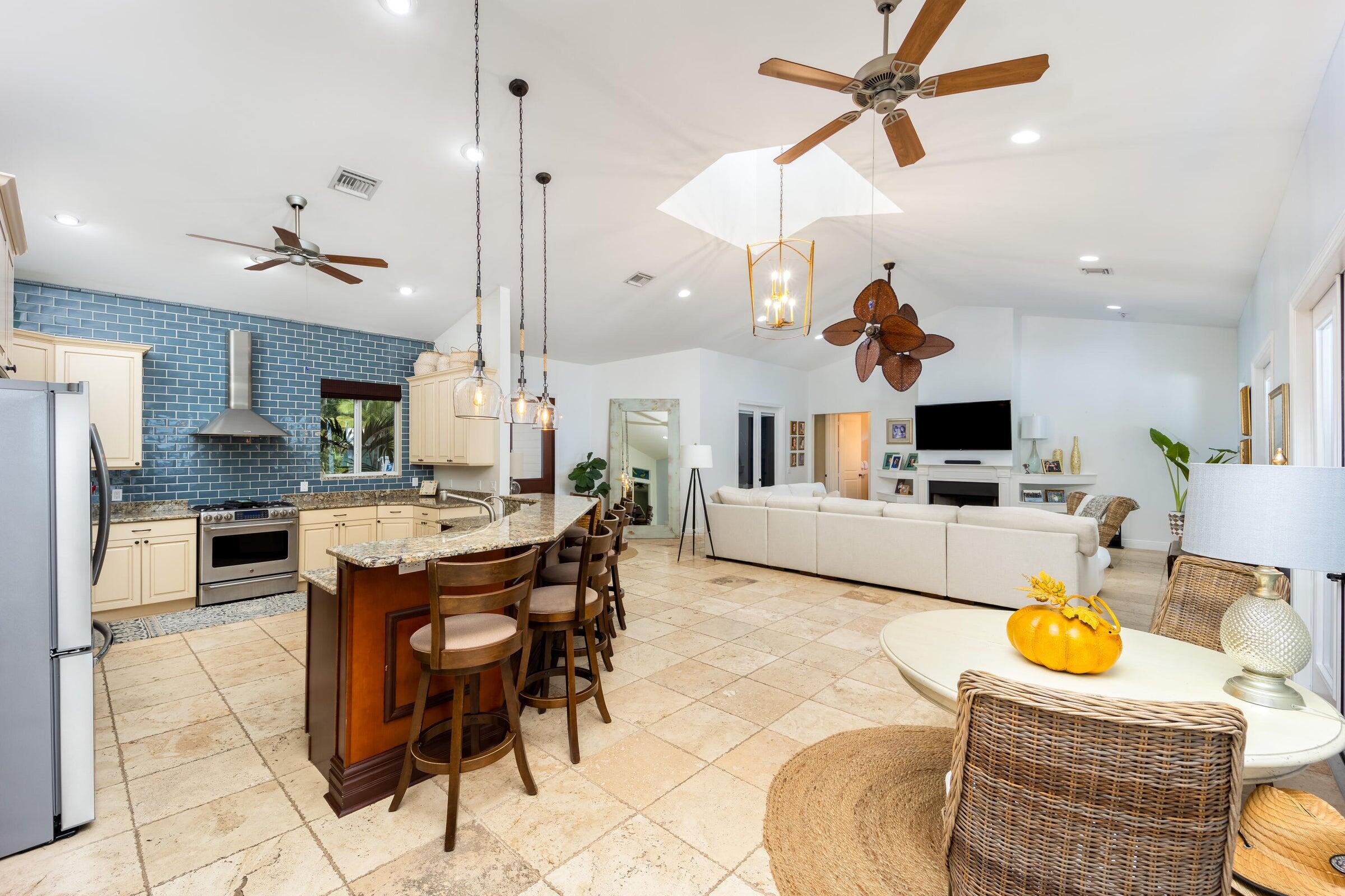 2672 Northwest S Shore Road Stuart, FL 34994 - Photo 23 of 53 a view of a kitchen and dining room