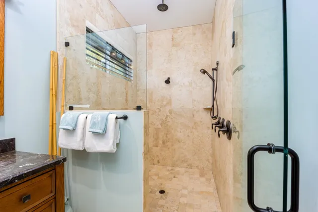 a bed room with a bed and a window