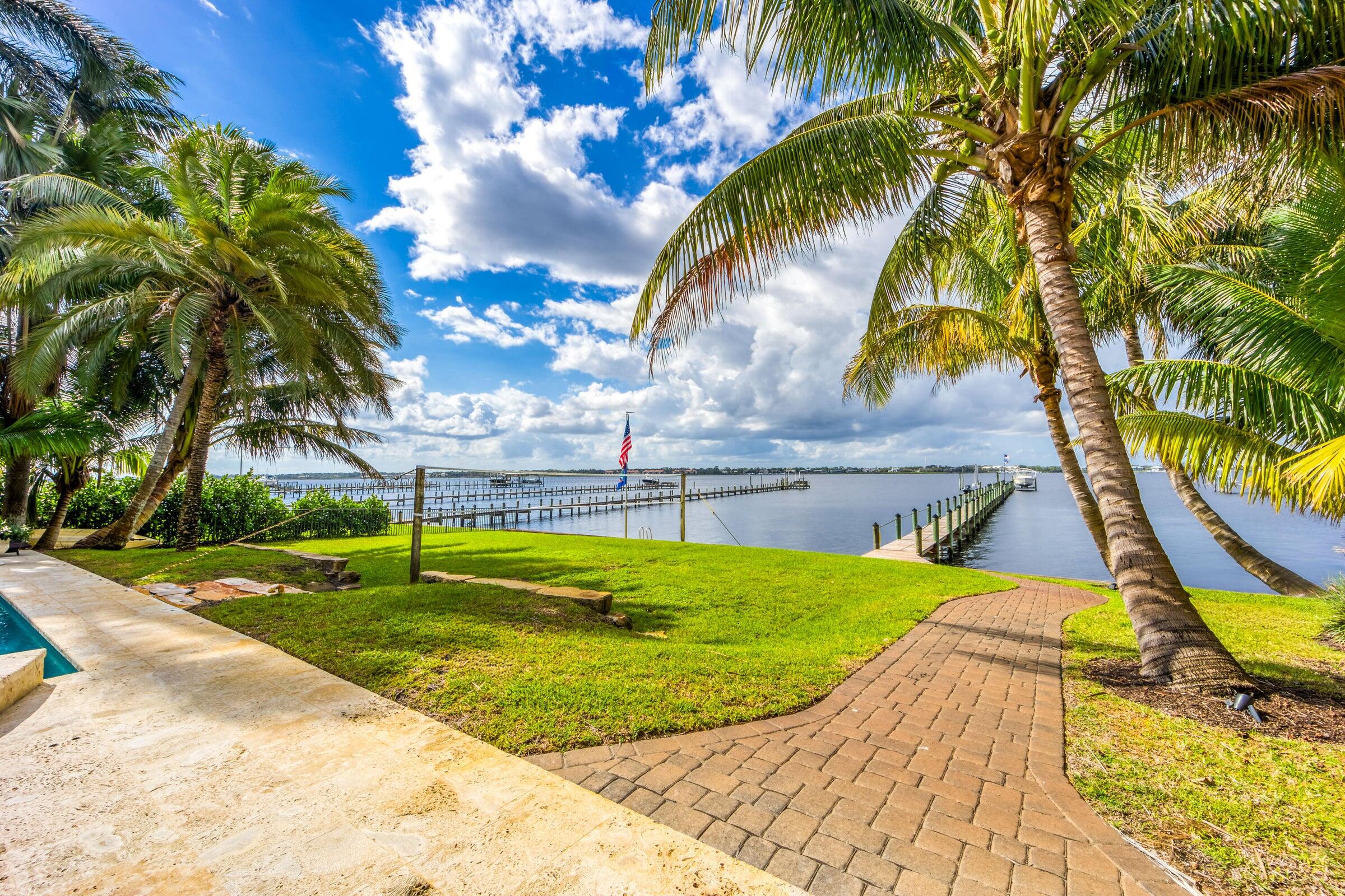 2672 Northwest S Shore Road Stuart, FL 34994 - Photo 7 of 53 a view of a backyard with swimming pool