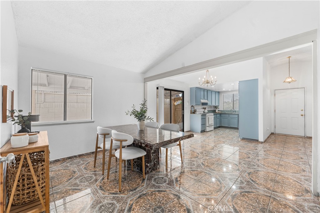 3542 East Ave R 10 Palmdale, CA 93550 - Photo 12 of 35 a view of a dining room with furniture