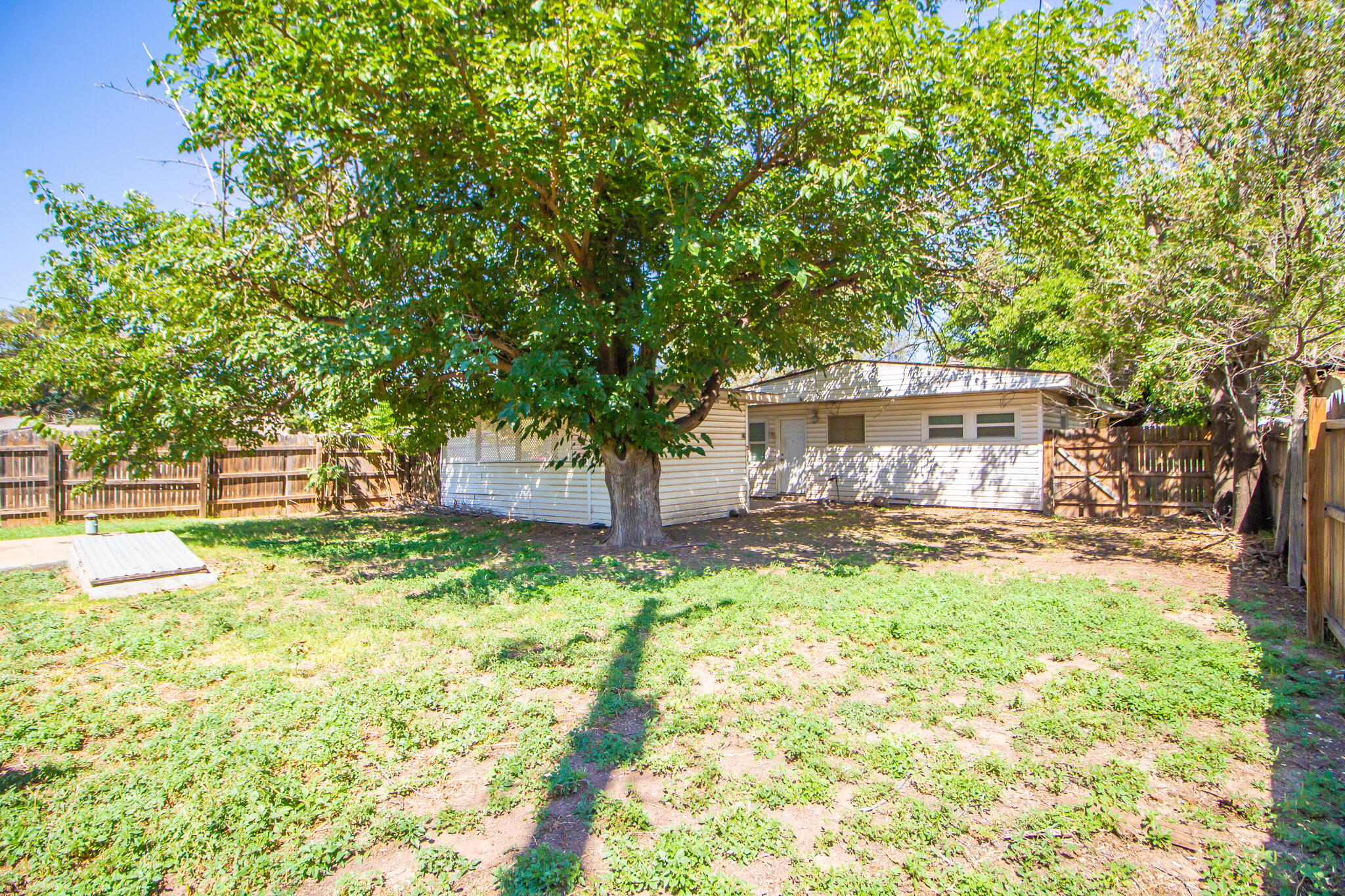 3721 31st Street Lubbock, TX 79410 - Photo 19 of 21 a view of a house with yard and sitting area