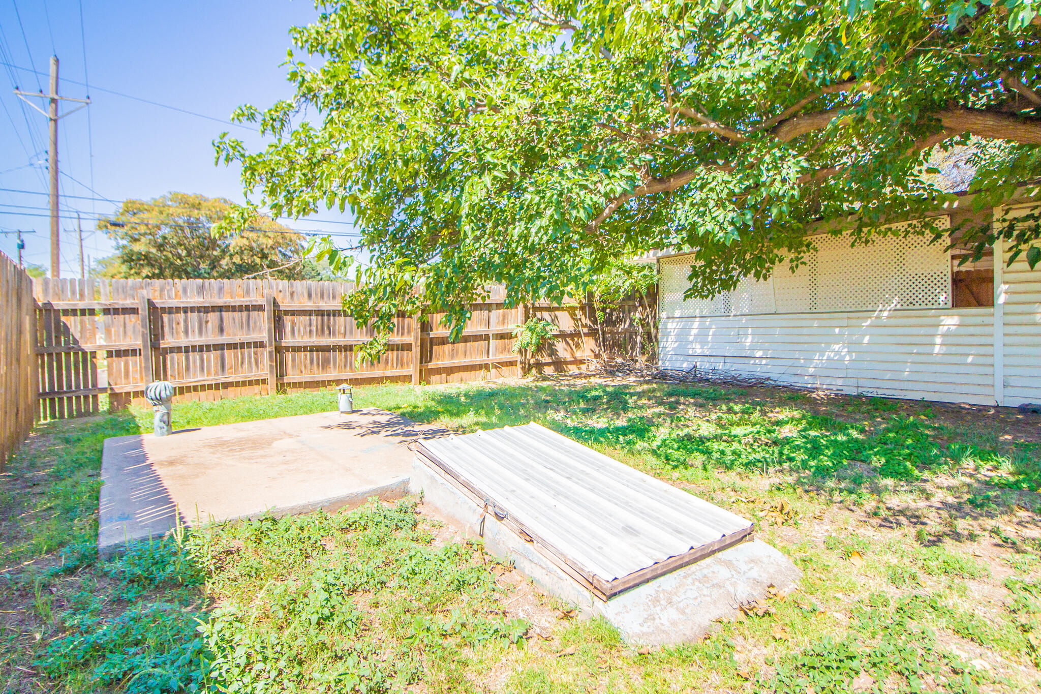 3721 31st Street Lubbock, TX 79410 - Photo 20 of 21 a view of a backyard with a garden