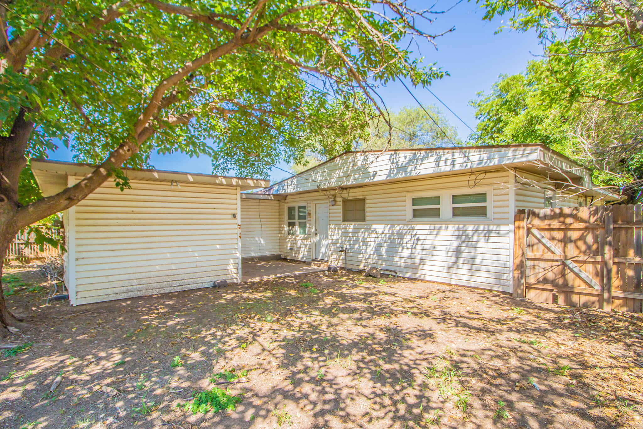 3721 31st Street Lubbock, TX 79410 - Photo 21 of 21 a view of a house with a yard