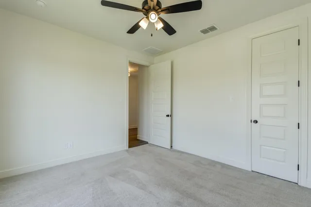 a bathroom with a tub and shower