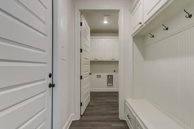 a view of cabinets and wooden floor