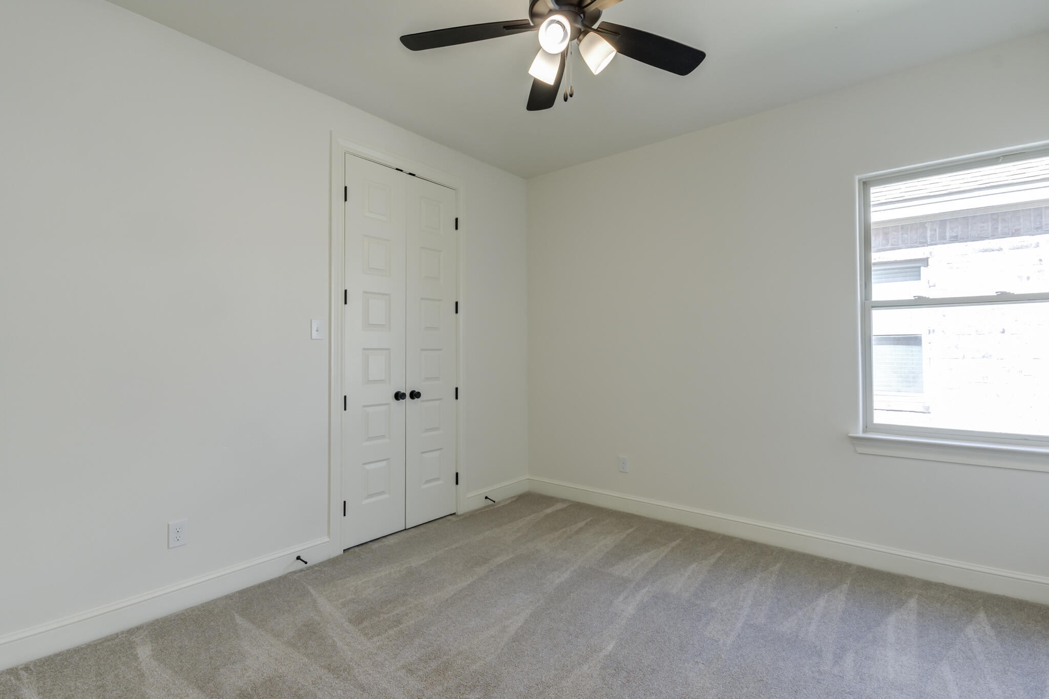 6904 55th Street Lubbock, TX 79407 - Photo 40 of 47 an empty room with a window
