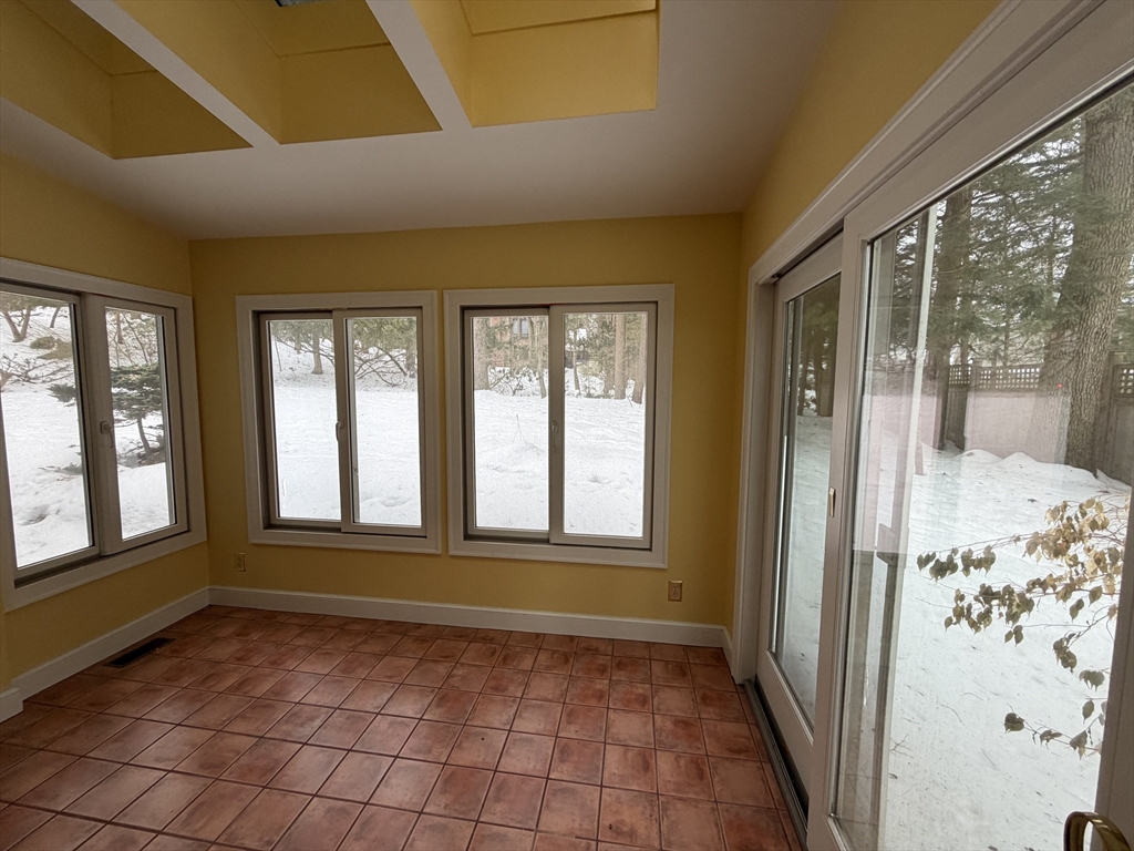 31 Fells Road Winchester, MA 01890 - Photo 12 of 22 a view of empty room with windows