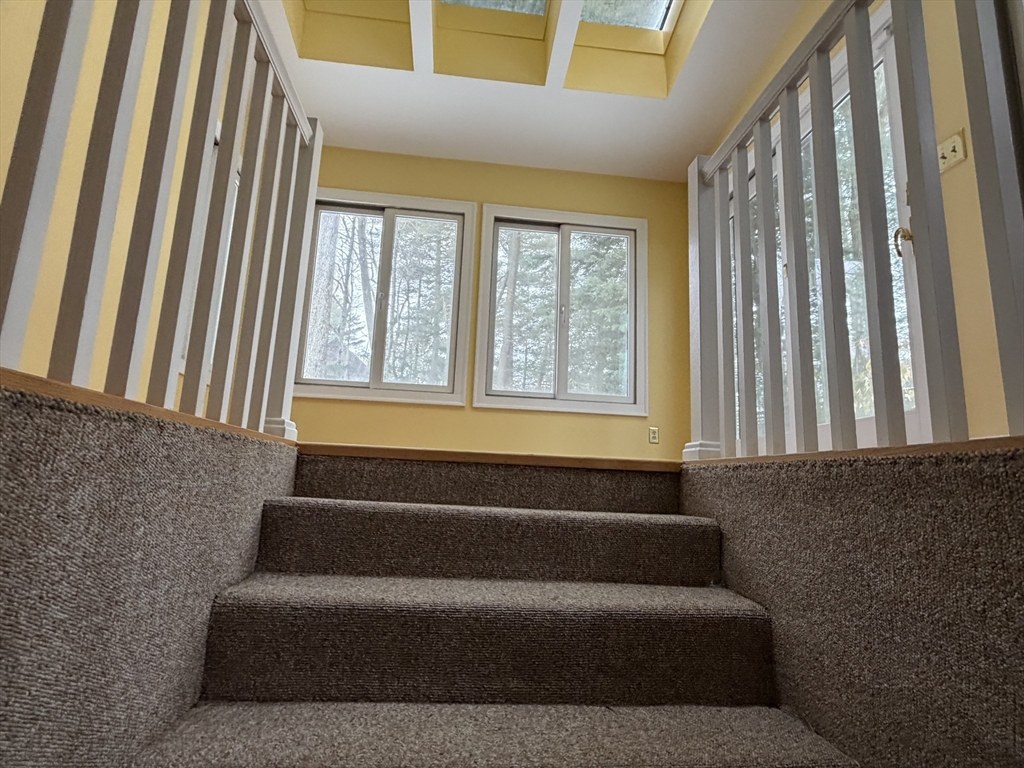 31 Fells Road Winchester, MA 01890 - Photo 14 of 22 a living room with furniture and a window