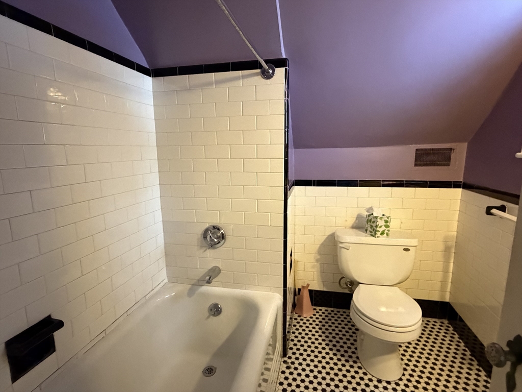 31 Fells Road Winchester, MA 01890 - Photo 19 of 22 a bathroom with a toilet and a shower