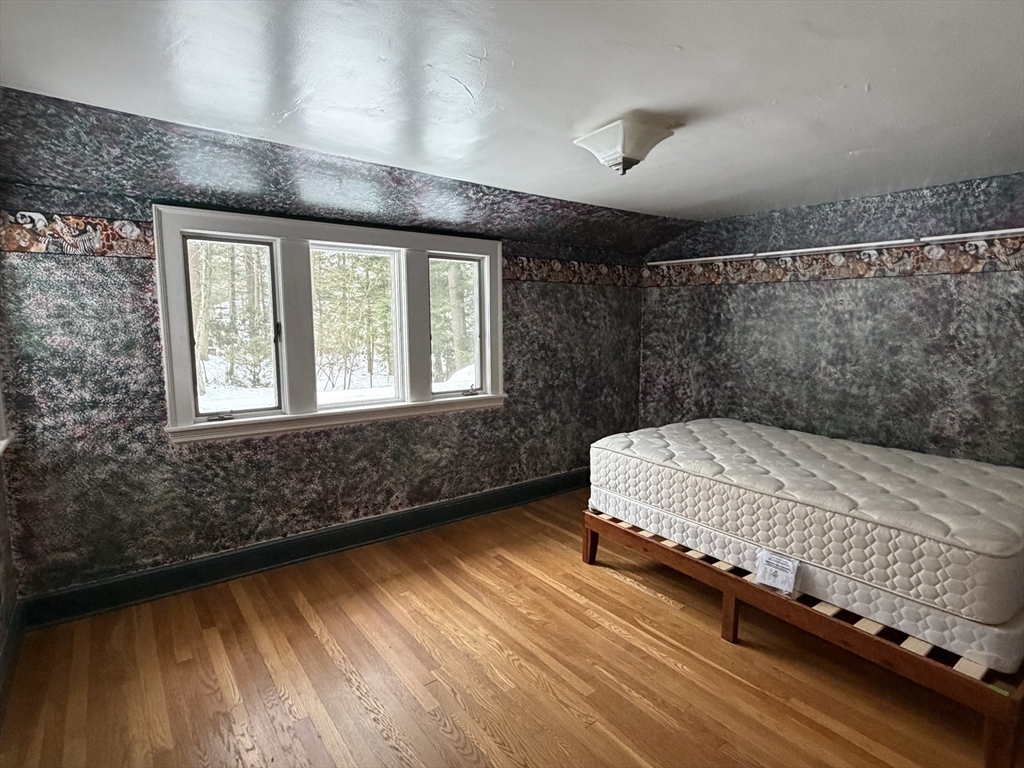 31 Fells Road Winchester, MA 01890 - Photo 20 of 22 a bedroom with a bed and a window