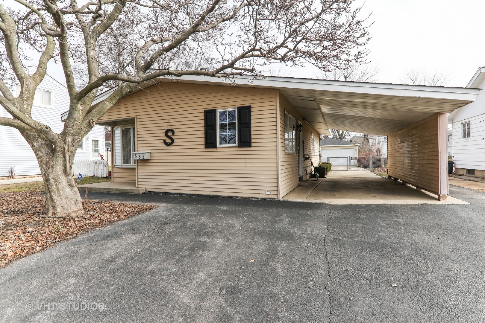 883 South York Street Elmhurst, IL 60126 - Photo 11 of 12 a view of a house with a backyard and tree