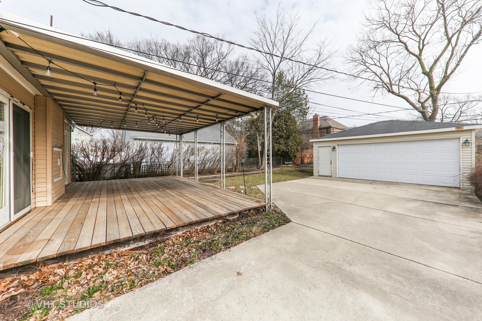 883 South York Street Elmhurst, IL 60126 - Photo 12 of 12 a view of backyard with a deck and wooden floor