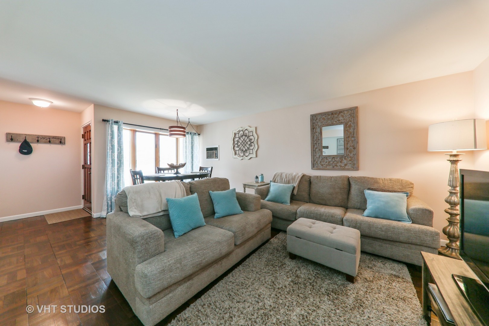 883 South York Street Elmhurst, IL 60126 - Photo 4 of 12 a living room with furniture and a couch
