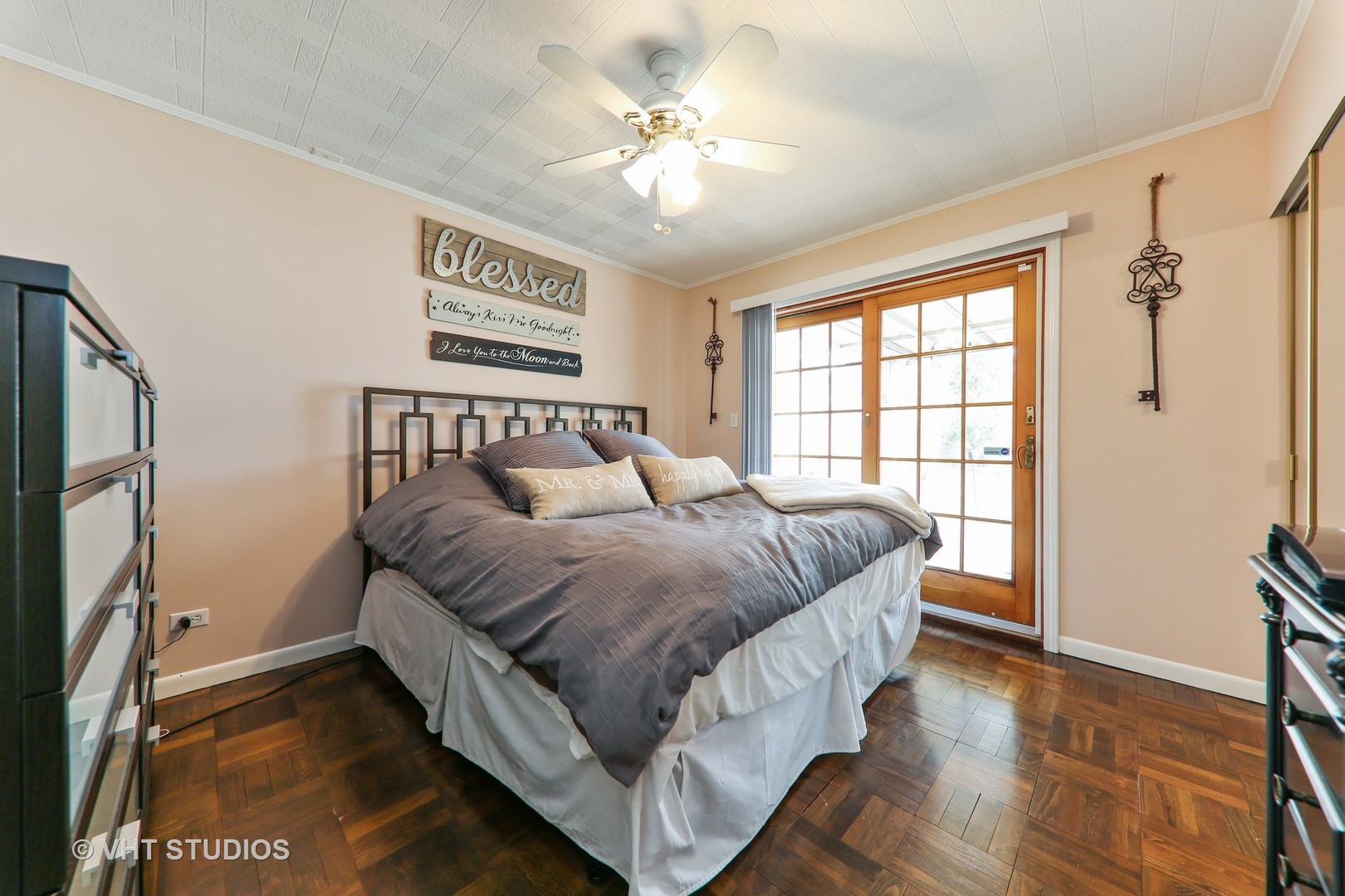 883 South York Street Elmhurst, IL 60126 - Photo 7 of 12 a bedroom with a large bed chandelier and a window