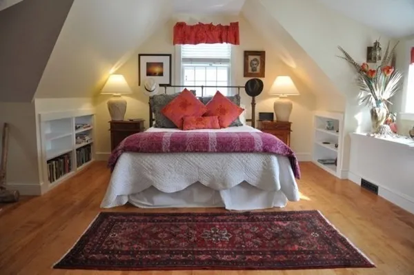 a living room with furniture rug and window