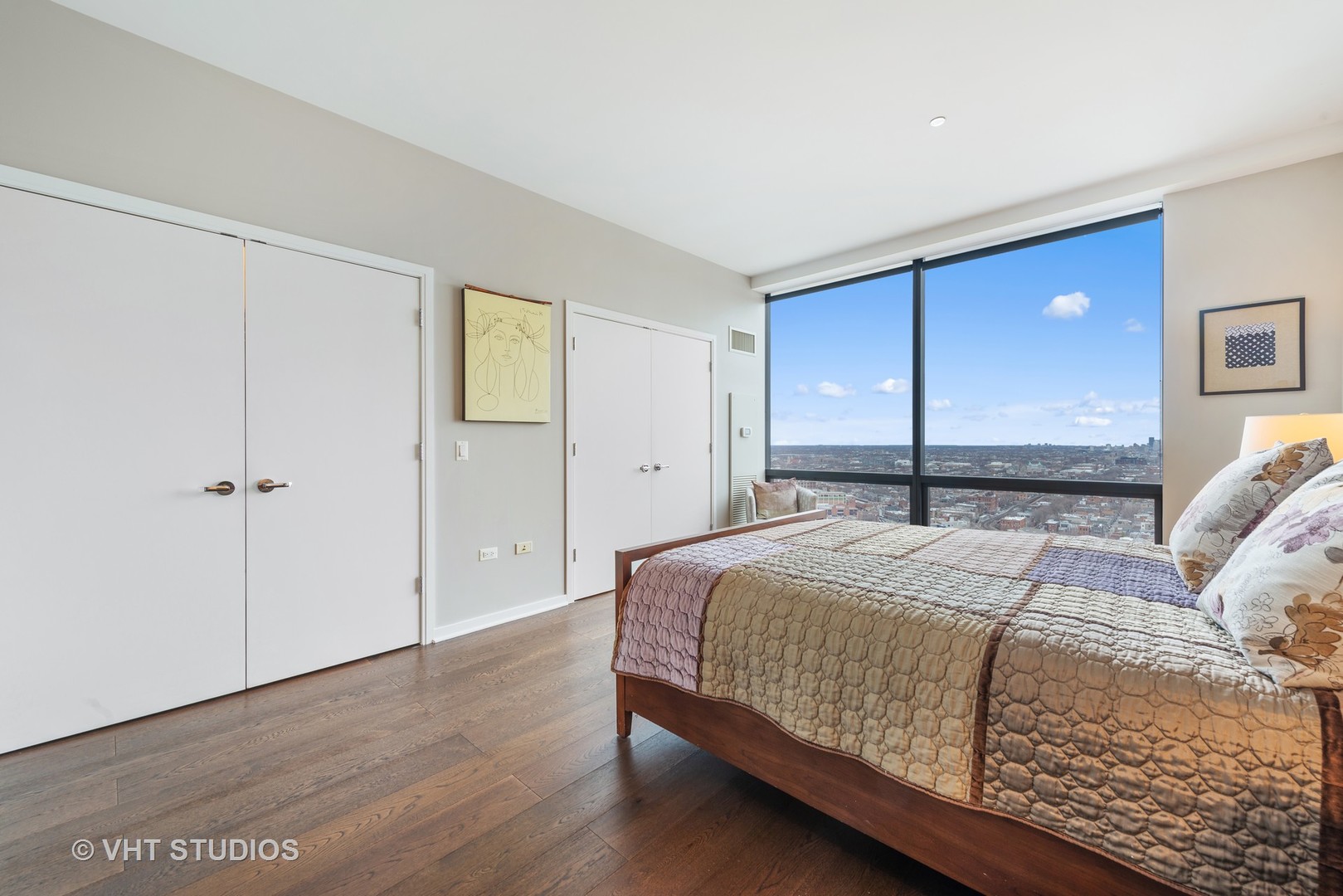 860 West Blackhawk Street, Unit 2803 Chicago, IL 60642 - Photo 11 of 17 a bedroom with a bed and a closet