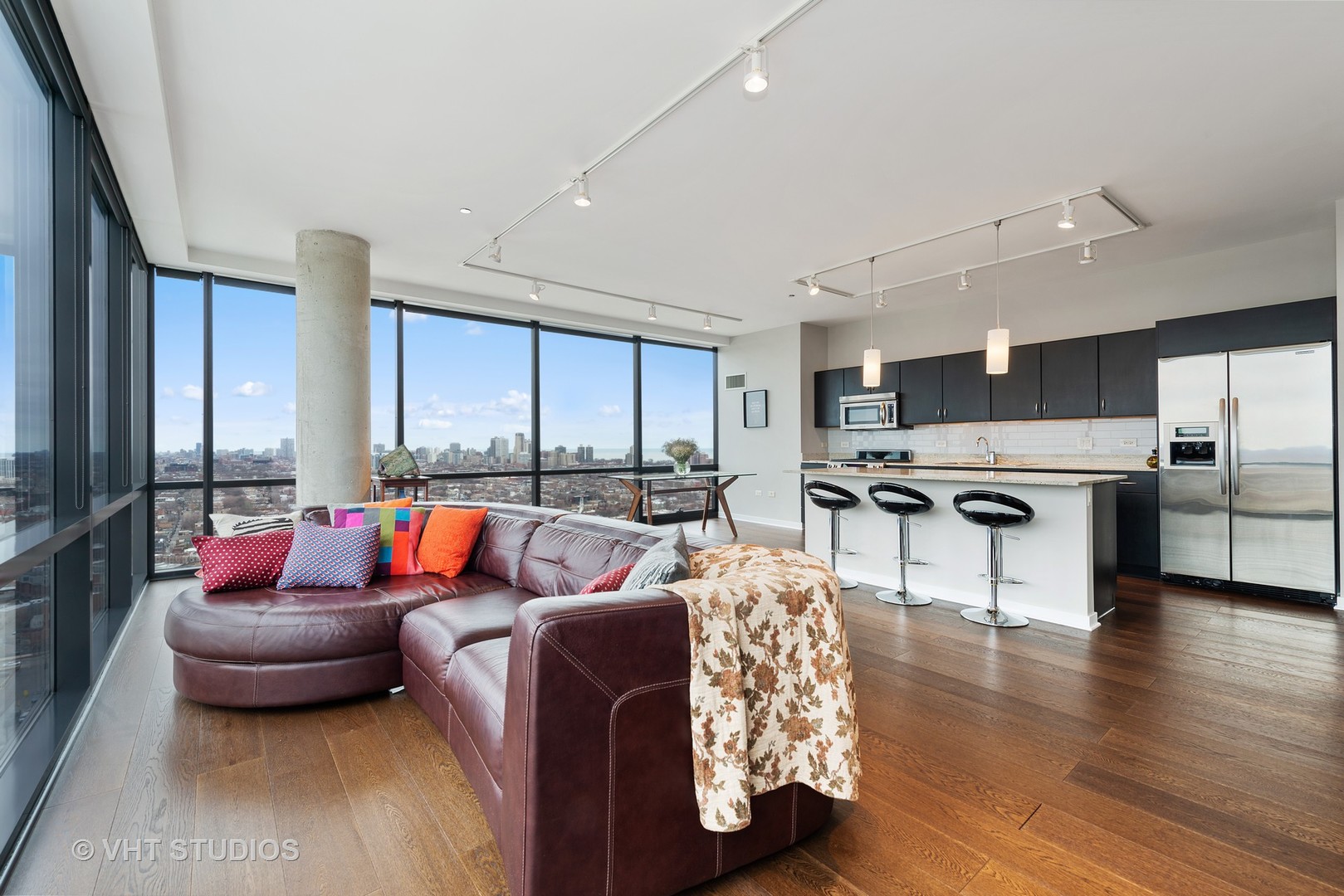 860 West Blackhawk Street, Unit 2803 Chicago, IL 60642 - Photo 4 of 17 a living room with furniture and a large window