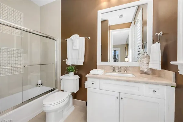 a utility room with a sink a washer and dryer