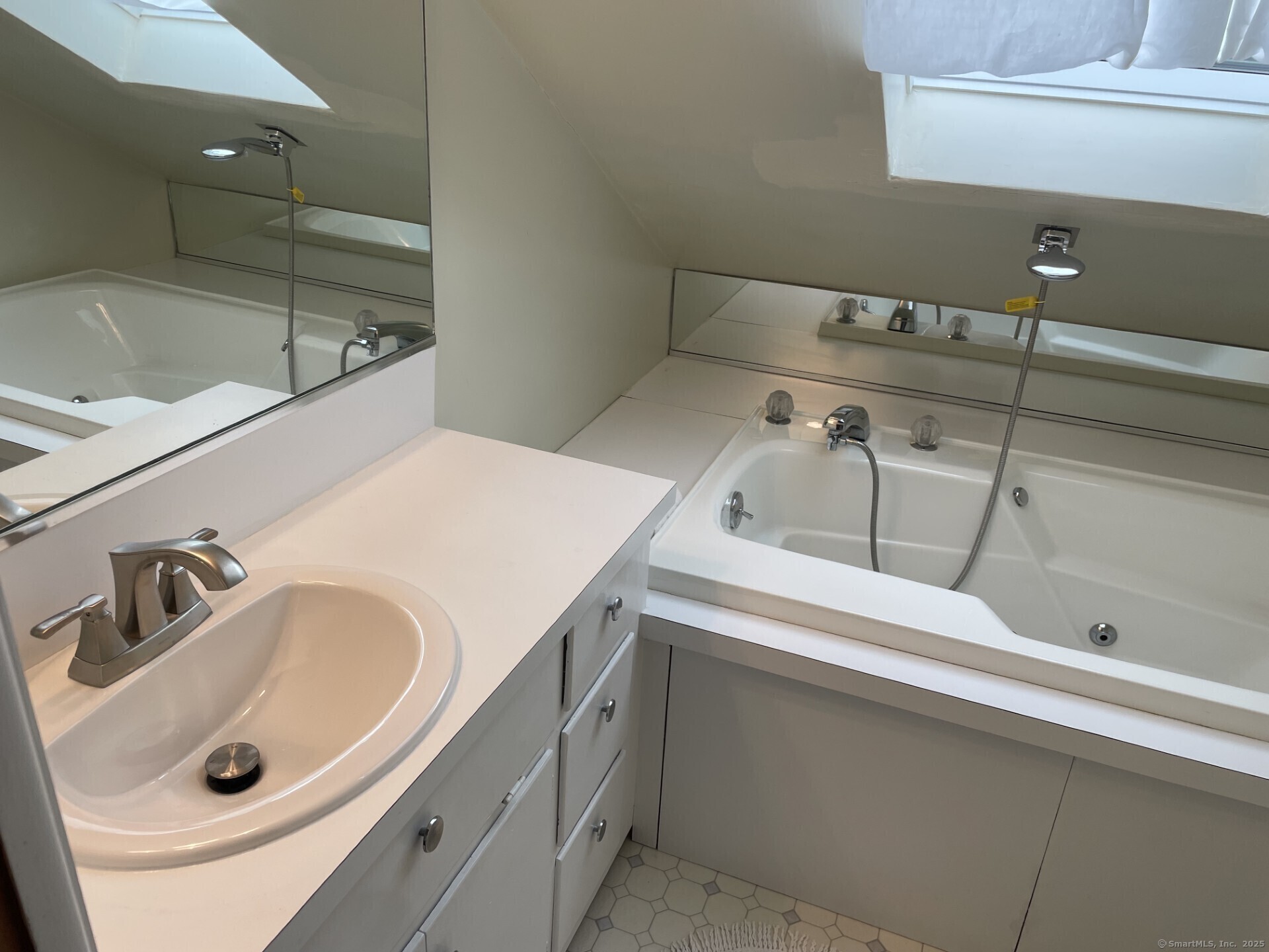 41 Harbor Avenue Madison, CT 06443 - Photo 17 of 27 a bathroom with a sink and a toilet