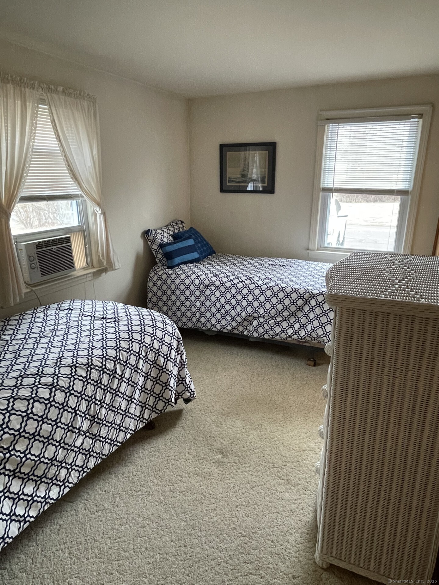41 Harbor Avenue Madison, CT 06443 - Photo 20 of 27 a bedroom with bed and window