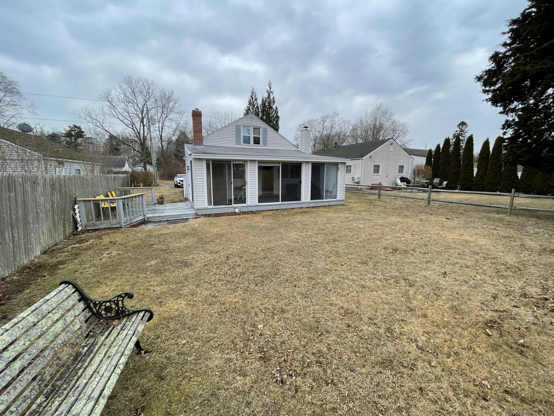 41 Harbor Avenue Madison, CT 06443 - Photo 26 of 27 a front view of a house with a yard