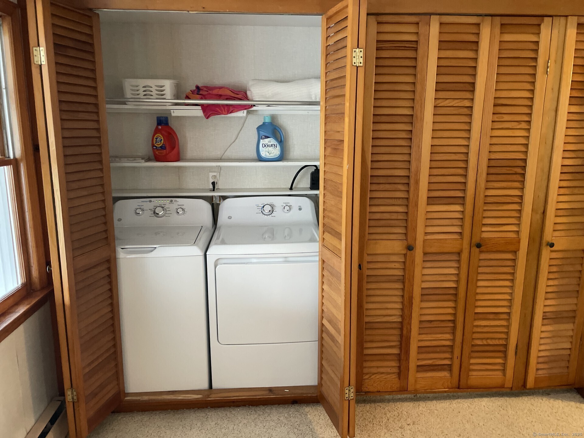 41 Harbor Avenue Madison, CT 06443 - Photo 27 of 27 a utility room with dryer and washer