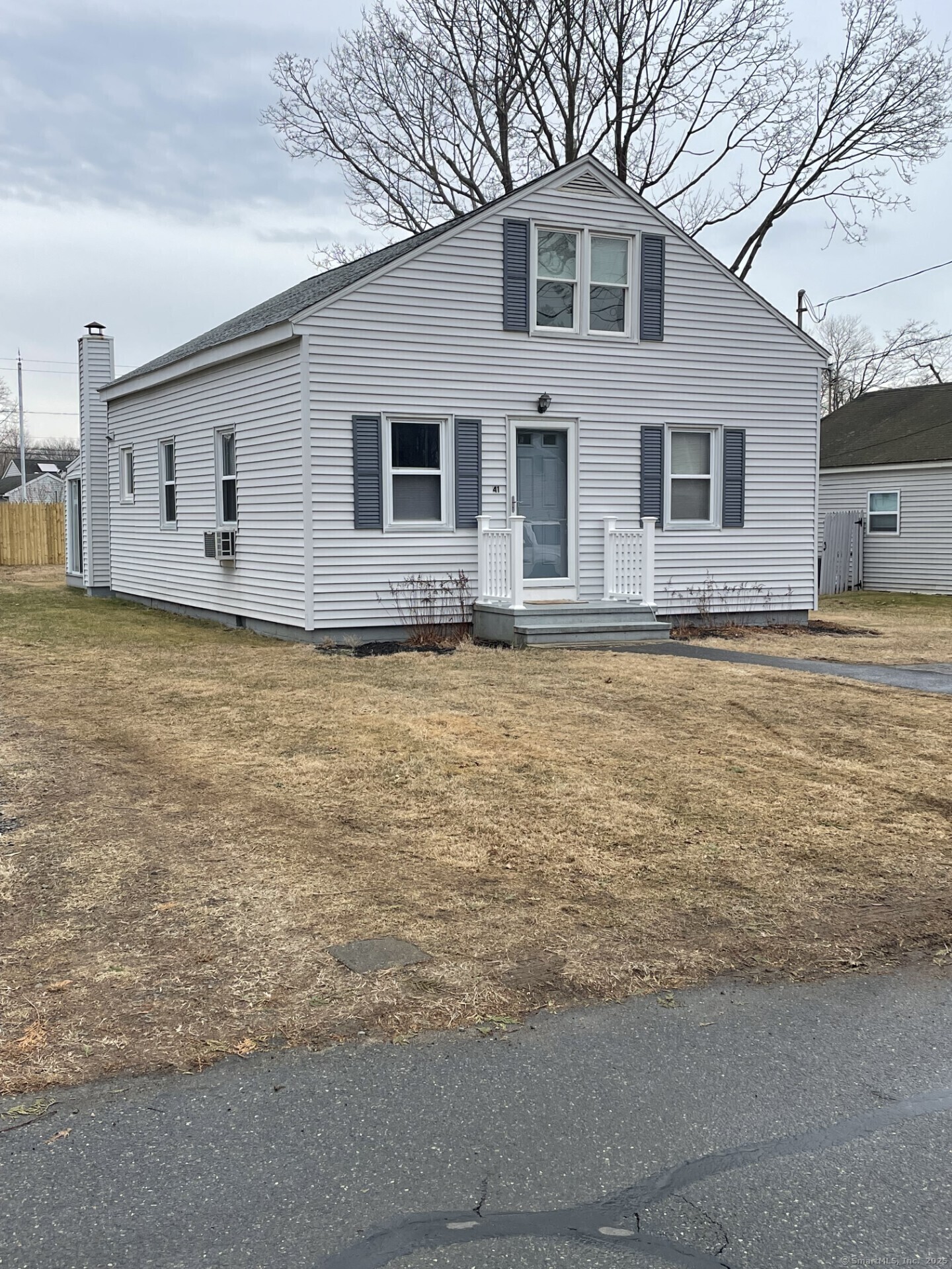 41 Harbor Avenue Madison, CT 06443 - Photo 3 of 27 a view of a house with a yard