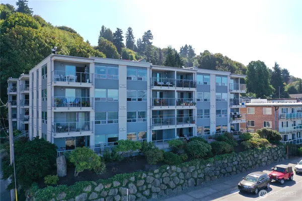 a front view of a building with garden