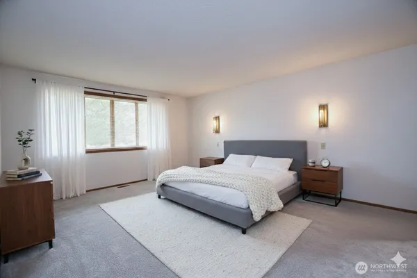 a view of room with a bench and a window