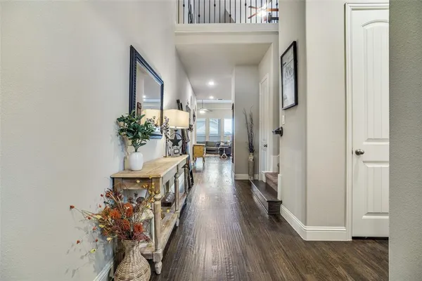 a hallway with wooden floor