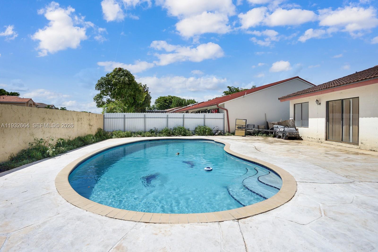 10290 Southwest 145th Place Miami, FL 33186 - Photo 2 of 50