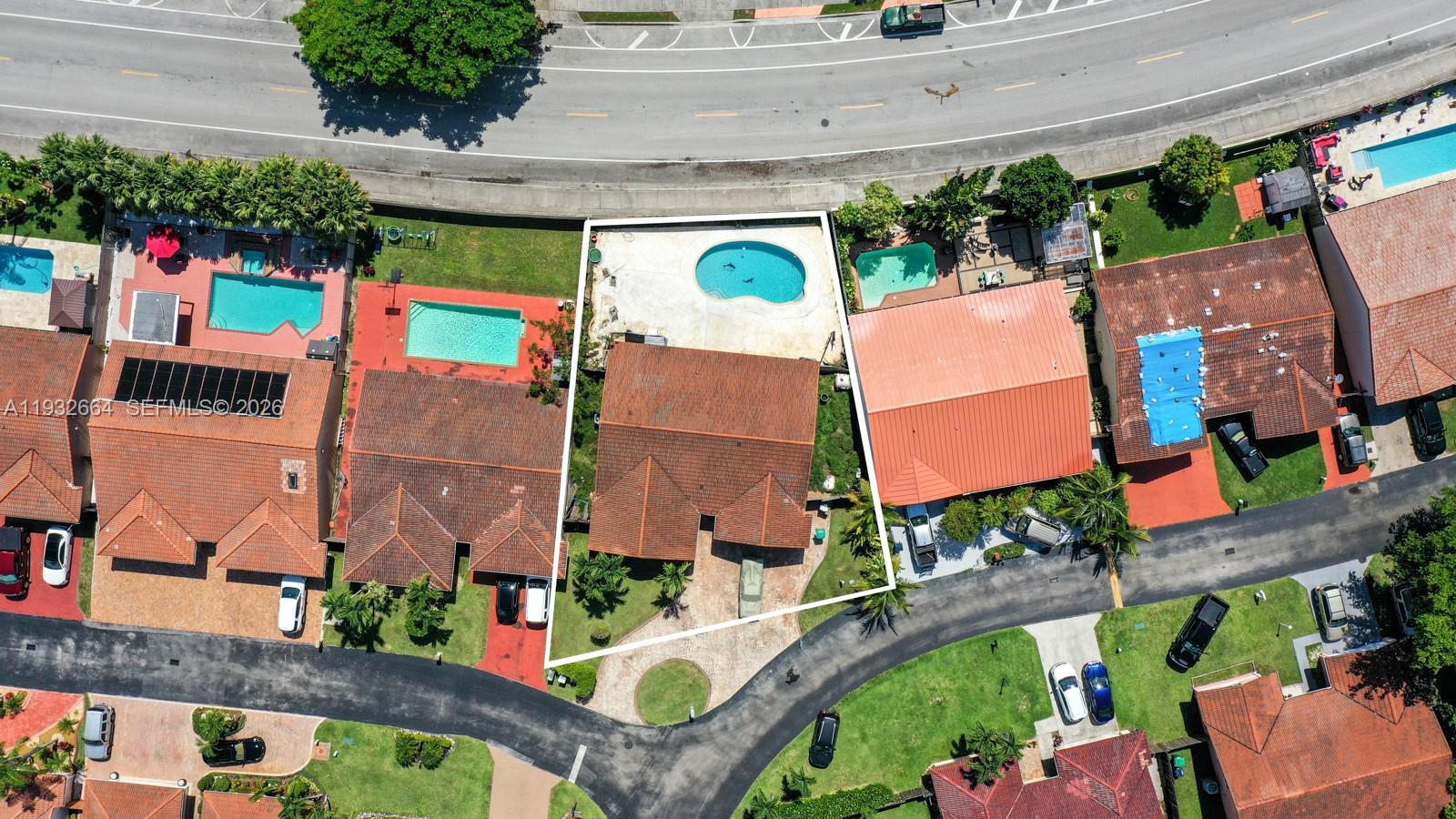 10290 Southwest 145th Place Miami, FL 33186 - Photo 32 of 50 an aerial view of multiple houses with outdoor space
