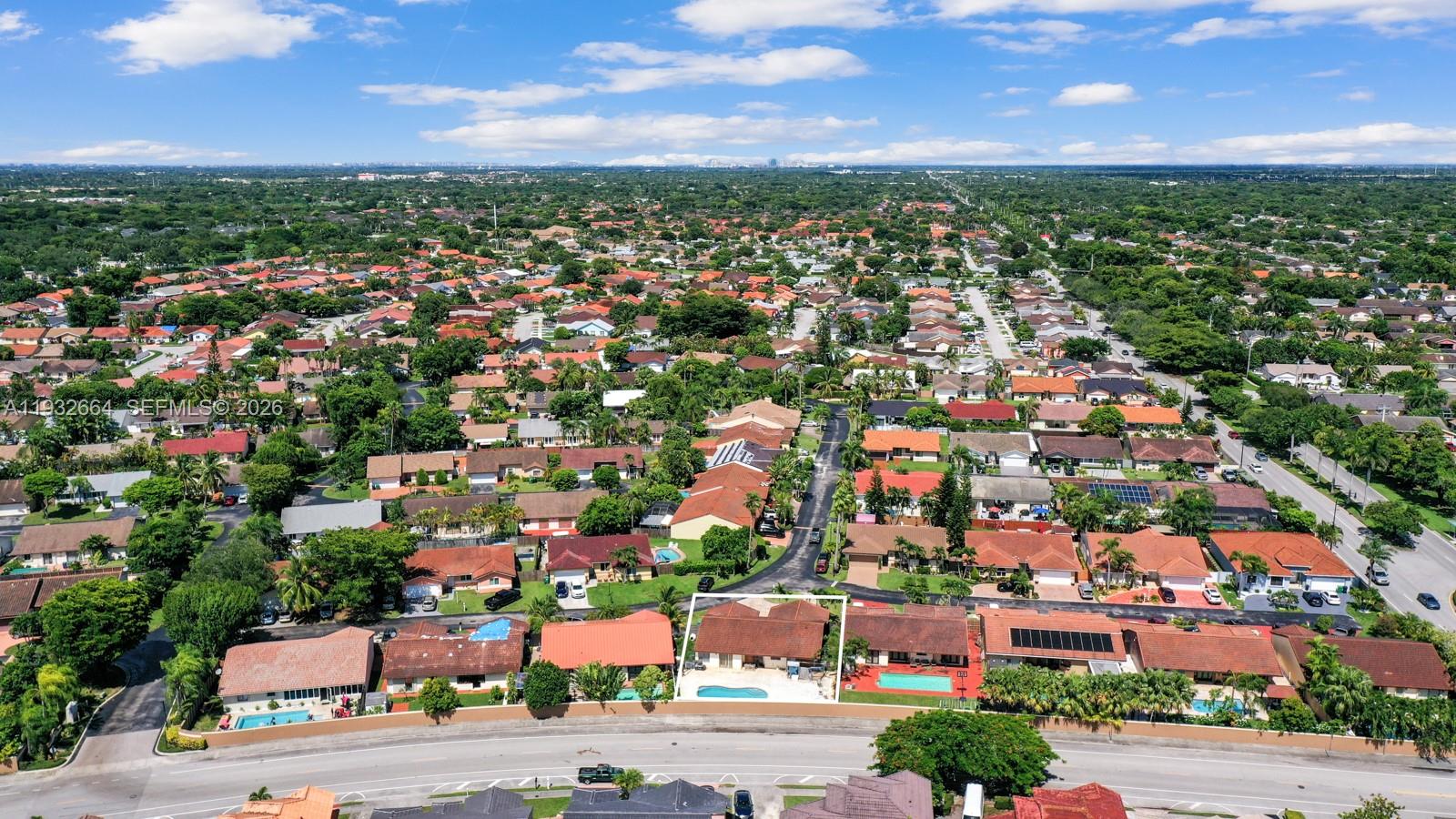 10290 Southwest 145th Place Miami, FL 33186 - Photo 34 of 50 an aerial view of a city