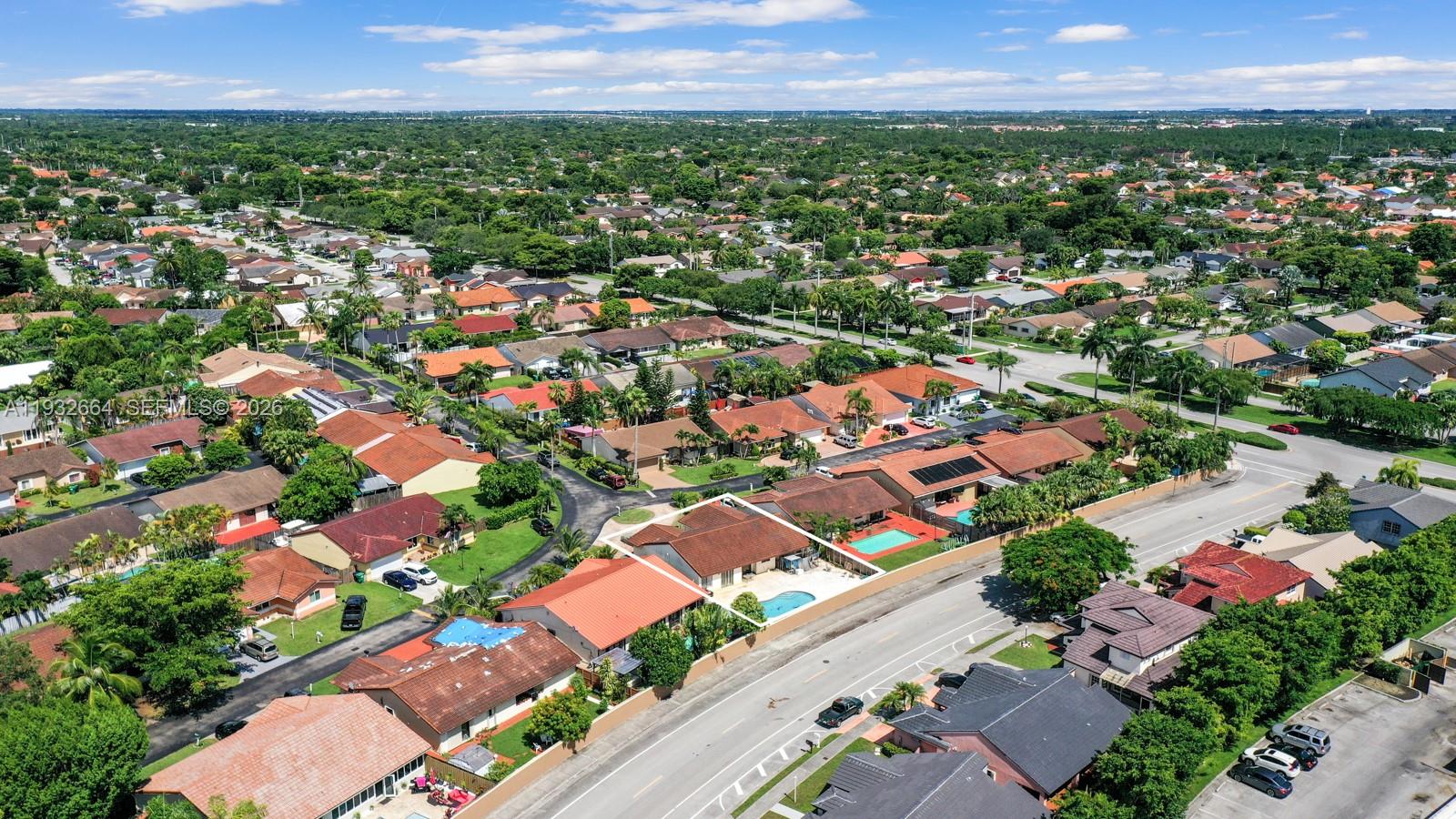10290 Southwest 145th Place Miami, FL 33186 - Photo 35 of 50 an aerial view of residential houses with outdoor space