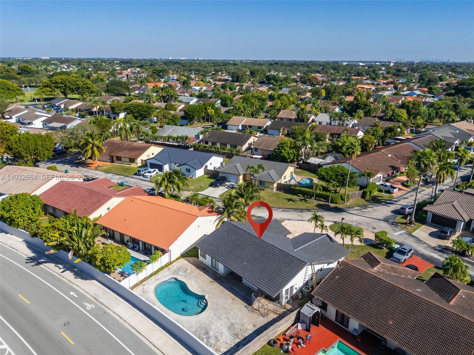 10290 Southwest 145th Place Miami, FL 33186 - Photo 45 of 50 an aerial view of a city
