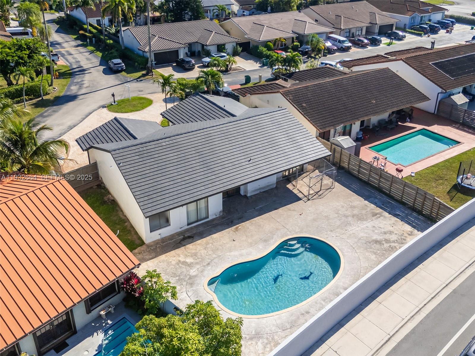 10290 Southwest 145th Place Miami, FL 33186 - Photo 5 of 45