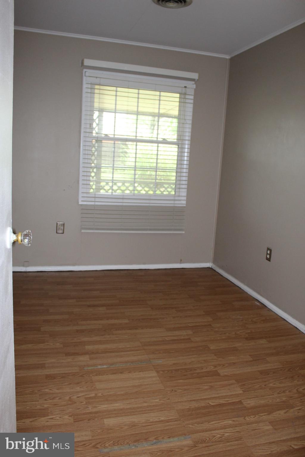 501 East New Street Lititz, PA 17543 - Photo 16 of 16 a view of an empty room with wooden floor and a window
