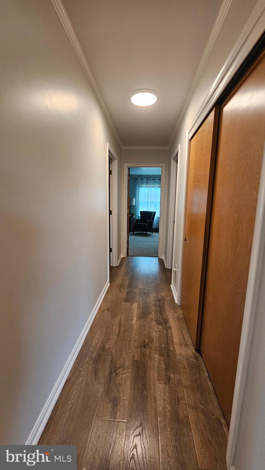 507 Decatur Place Easton, MD 21601 - Photo 15 of 29 Corridor to guest bedroom/office and Primary BR