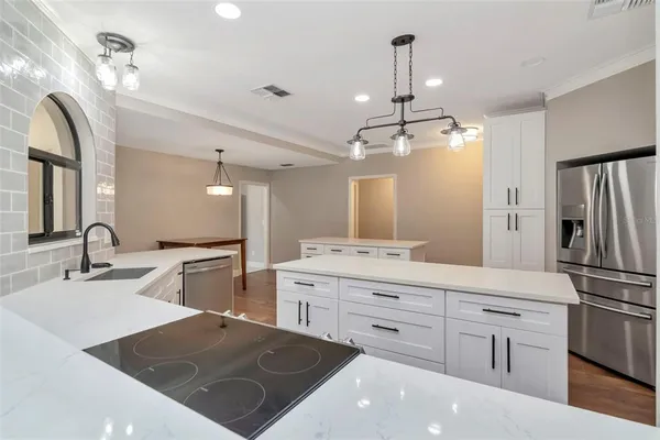 a bathroom with a double vanity sink and mirror