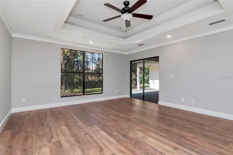 a bathroom with a toilet a sink a vanity and mirror