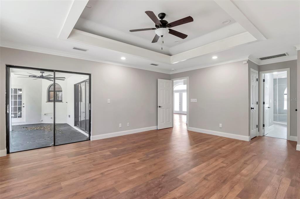 18306 Pleasant Ridge Place Lutz, FL 33548 - Photo 36 of 64 a view of an empty room and wooden floor