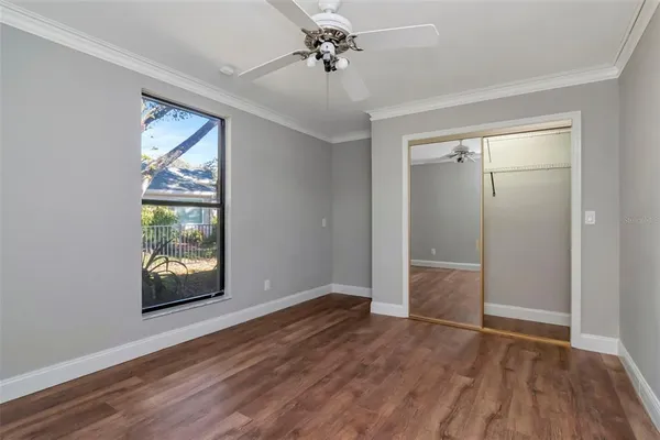 a big yard with lots of trees and plants