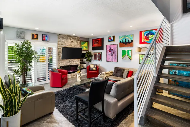 a living room with furniture and a couch