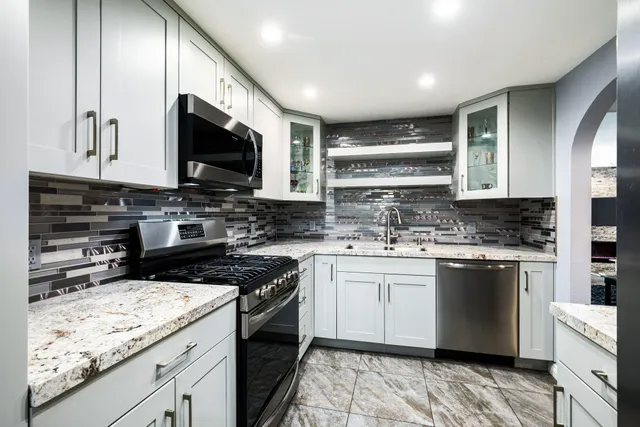a view of a chairs and table in the patio