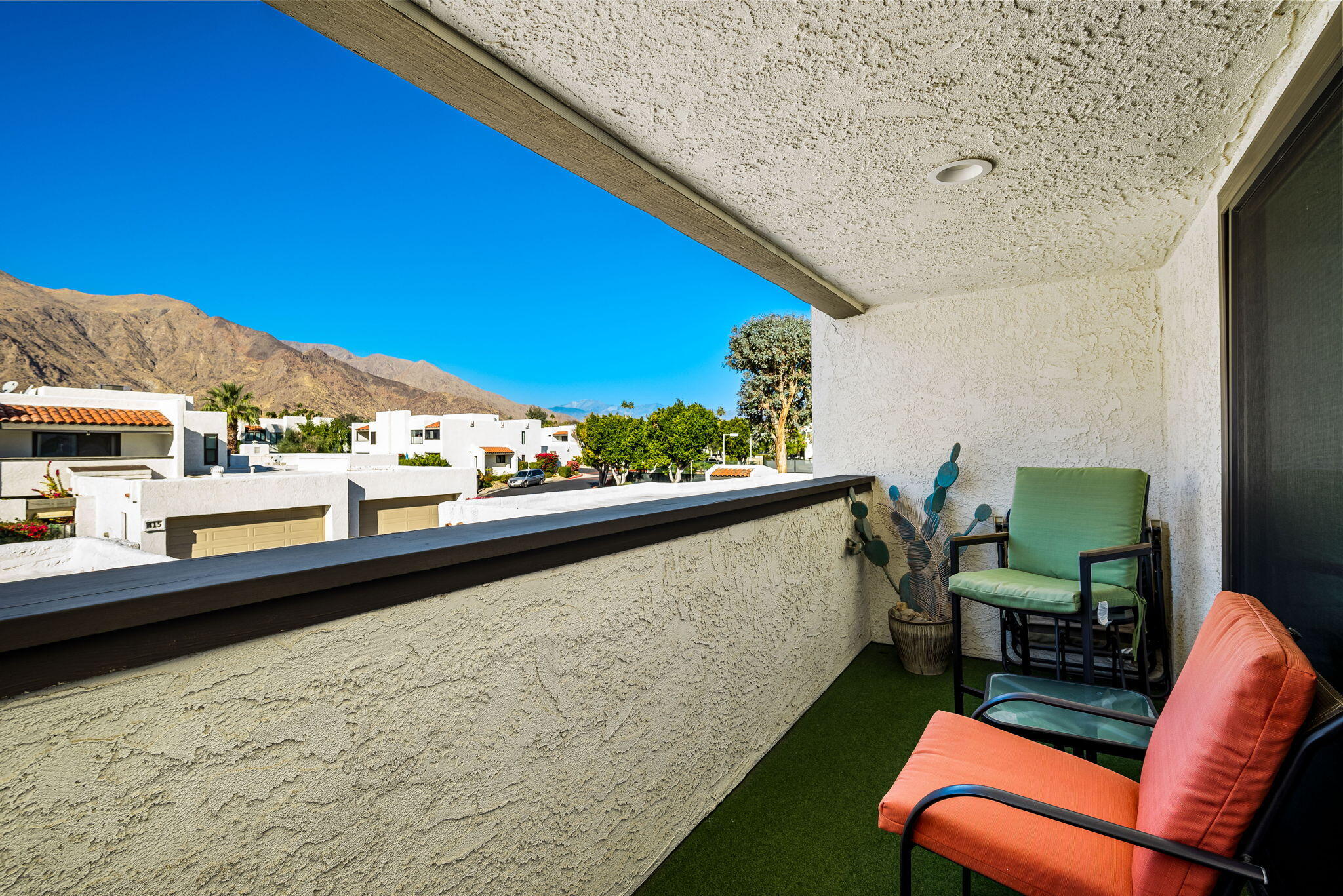 412 Rio Vista Drive Palm Springs, CA 92262 - Photo 27 of 45 a view of a chairs and table in patio