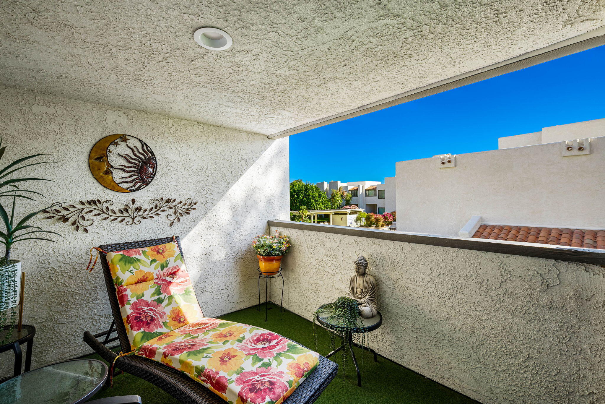 412 Rio Vista Drive Palm Springs, CA 92262 - Photo 33 of 45 a view of a hallway with paintings on the wall