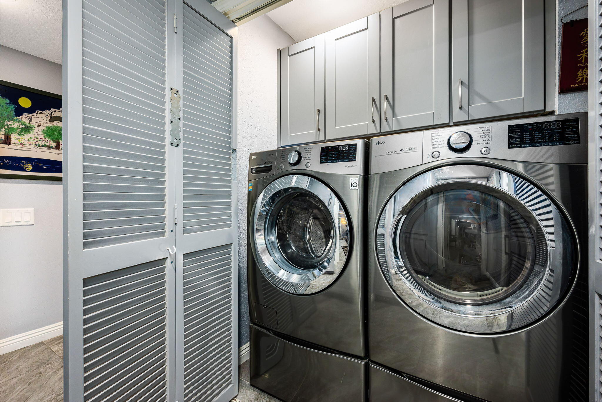 412 Rio Vista Drive Palm Springs, CA 92262 - Photo 40 of 45 a utility room with dryer and washer