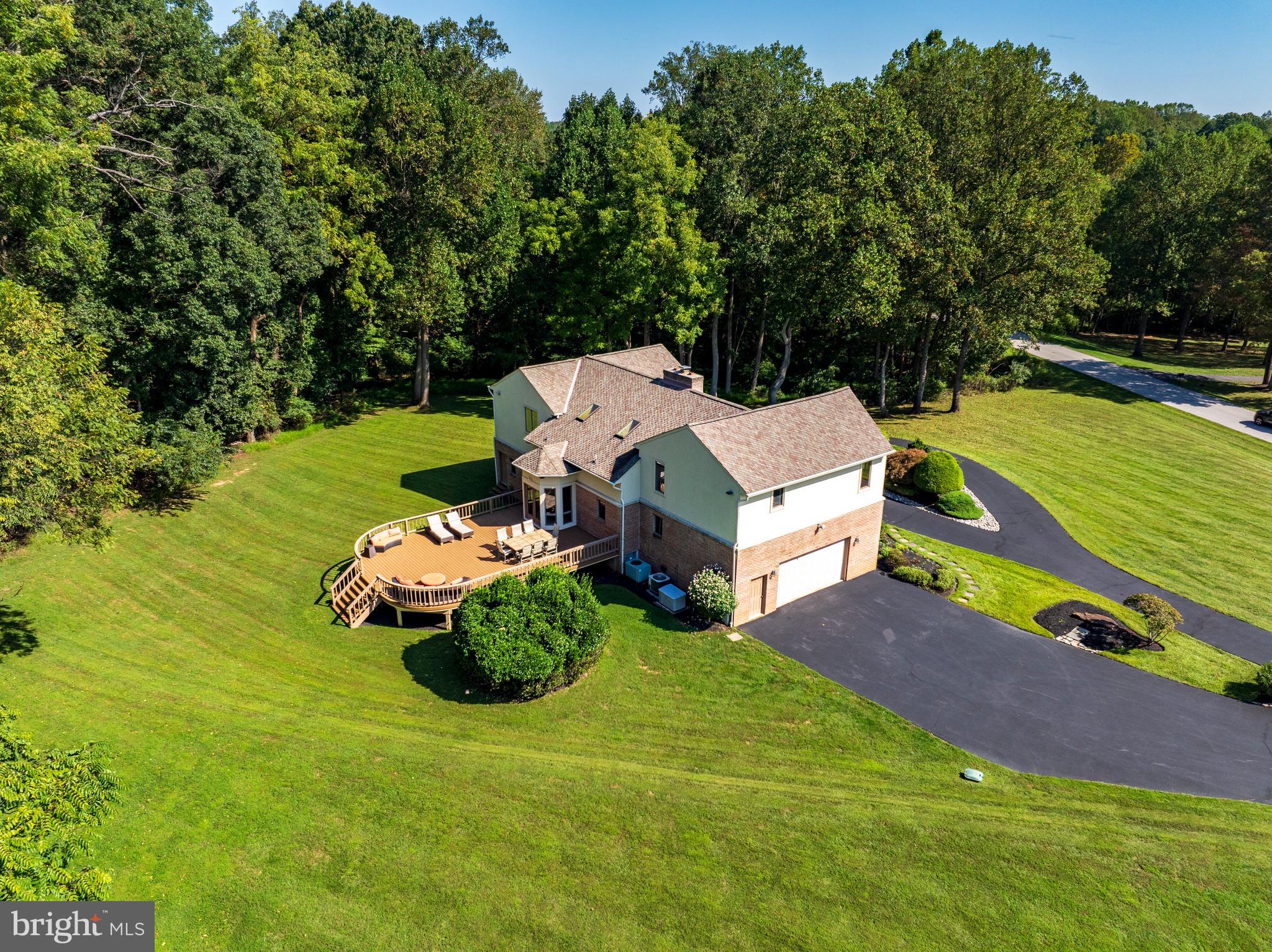 13304 Ridgewood Drive Ellicott City, MD 21042 - Photo 79 of 95 an aerial view of a house with outdoor space patio swimming pool and outdoor seating
