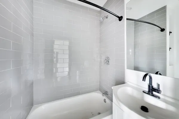 a bathroom with a sink and a tub
